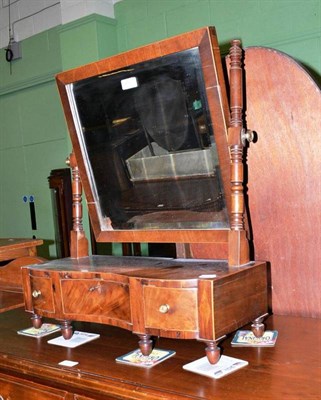 Lot 466 - A 19th century mahogany serpentine-fronted toilet mirror