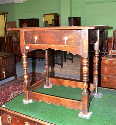 Lot 488 - Bobbin leg oak low boy