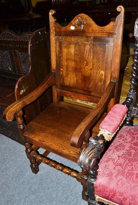 Lot 500 - Panelled oak armchair