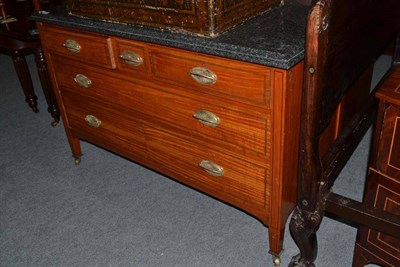 Lot 521 - A satinwood chest with granite top