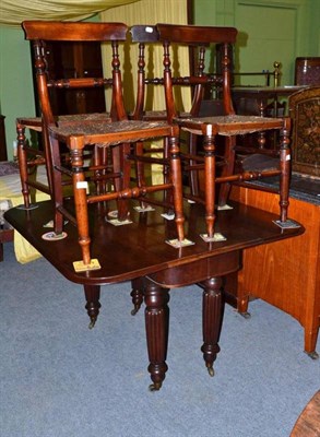 Lot 523 - Set of four 19th century mahogany rush seat chairs and a Victorian mahogany drop leaf table