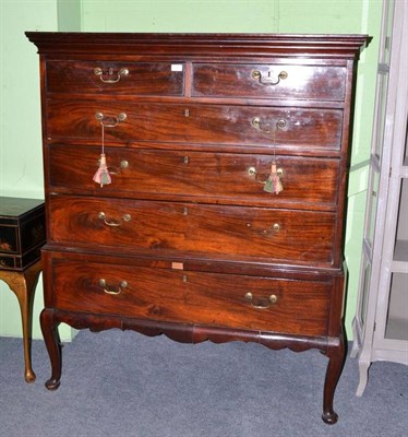 Lot 545 - A George III mahogany chest on stand