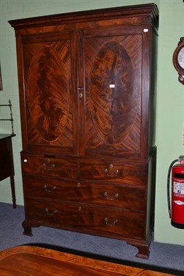 Lot 557 - Mahogany linen press