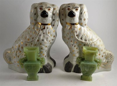 Lot 2 - A pair of Staffordshire figures of spaniels and a pair of Chinese jade type vases