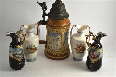 Lot 8 - A Mettlach stein and two pairs of vases