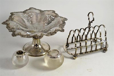Lot 9 - Two silver mounted match balls, plated toast rack and a pedestal comport