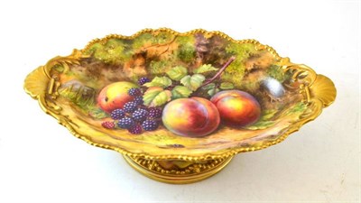 Lot 97 - A Royal Worcester Porcelain Oval Pedestal Dish, 1925, painted with a still life of fruit within...