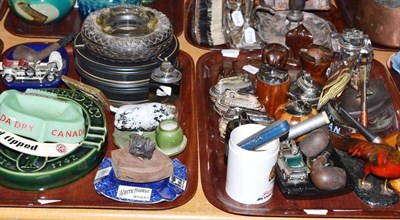 Lot 27 - Two trays of smoking related items including a spelter golden pheasant strike a light,...