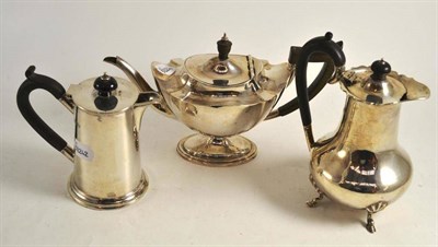 Lot 31 - A silver hot water jug, tea pot and coffee pot