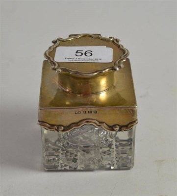 Lot 56 - A silver mounted glass inkwell, Birmingham 1919 (damaged)