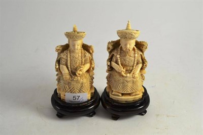 Lot 57 - Two carved ivory figures on stands