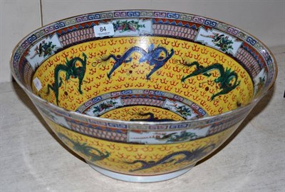 Lot 84 - A Chinese yellow ground dragon bowl, circa 1900