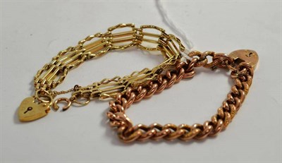 Lot 92 - A 9ct gold gatelink bracelet and a curb link bracelet