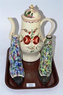 Lot 117 - A creamware coffee pot and cover, and two gin flasks as boots