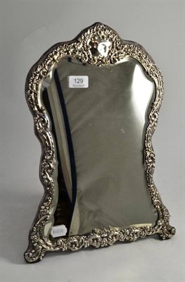 Lot 129 - A silver mounted dressing table mirror