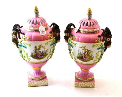 Lot 109 - A Pair of Berlin Porcelain Urn Shaped Vases and Covers, 19th century, with goat mask handles,...