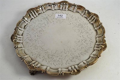 Lot 142 - A Victorian silver salver, Sheffield 1844, with shell and scroll border and shell feet