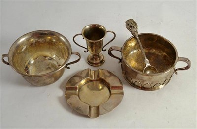 Lot 185 - Two silver sugar bowls, silver ashtray, silver spoon, small silver trophy cup