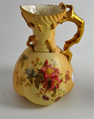 Lot 195 - A Royal Worcester porcelain blush ivory ewer