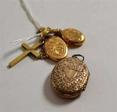 Lot 221 - Three gold lockets and a crucifix