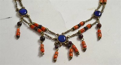 Lot 247 - A lapis lazuli and coral set drop detail necklace (a.f.)