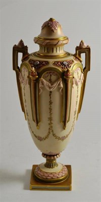 Lot 251 - A Royal Worcester two handled porcelain vase and cover