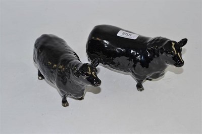 Lot 255 - A Beswick Aberdeen Angus bull and cow