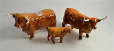 Lot 262 - A Beswick Highland bull, cow and calf