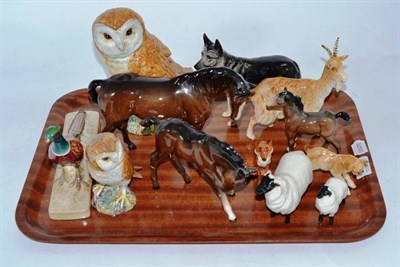 Lot 269 - A collection of Beswick including two owls, pheasants, fox, etc