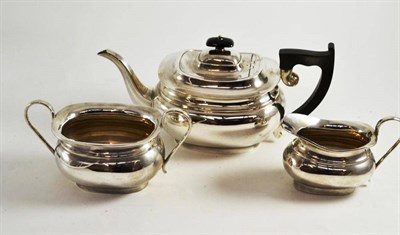 Lot 288 - A silver three piece tea service