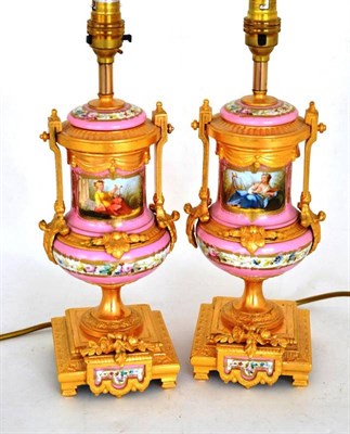 Lot 125 - A Pair of Gilt Metal Mounted French Porcelain Campana Vases, circa 1880, each with pink ground...
