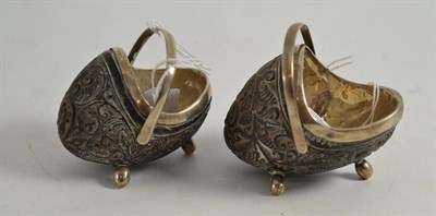 Lot 309 - Pair of Indian silver and coconut salts