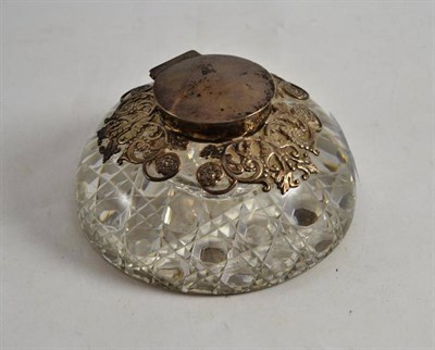 Lot 310 - A late Victorian heavy glass inkwell with silver mounts, London 1895