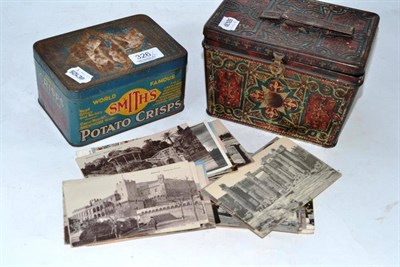 Lot 326 - A collection of postcards, in two tins