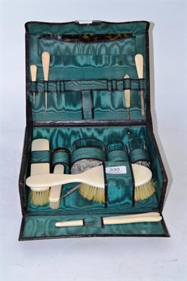 Lot 330 - Crocodile vanity case with silver fittings