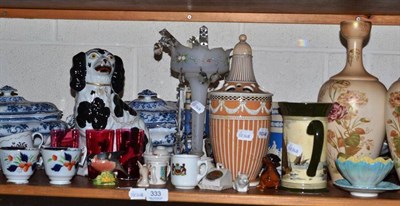 Lot 333 - A shelf of decorative ceramics and glass including a graduated set of three Copeland jugs, a...