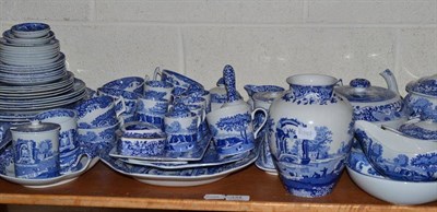 Lot 334 - A large quantity of Spode blue and white Italian pattern breakfast, dinner and tea wares on a shelf