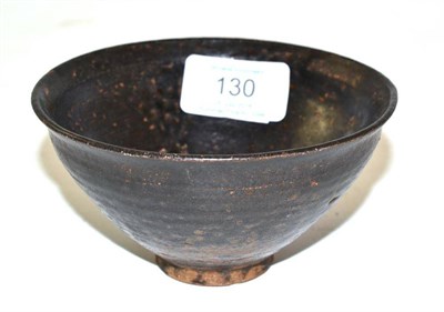 Lot 130 - A Chinese Stoneware Bowl, probably Northern Song, decorated with a brown petal shaped panel on...