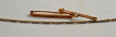 Lot 361 - Two tie clips stamped 9ct, a yellow metal chain with clasp stamped 750 and a white metal fine chain