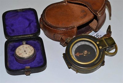 Lot 364 - A leather cased compass and another instrument, cased