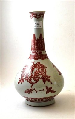 Lot 133 - A Chinese Porcelain Bottle Vase, in 18th century style, painted in underglaze red with fruiting...