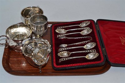 Lot 392 - A cased set of six silver teaspoons and tongs, a sauceboat, a Christening mug, a double handled...