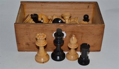 Lot 393 - A boxwood and ebony Staunton chess set, height of kings 8cm, in a lidless box