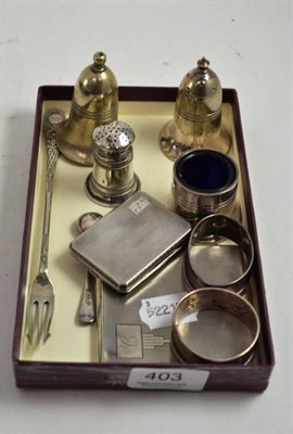 Lot 403 - Silver cigarette case, silver match case, pepperette, two silver napkin rings, plated...