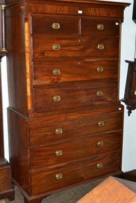 Lot 478 - A George III mahogany chest on chest, with two short over three long drawers, between canted...