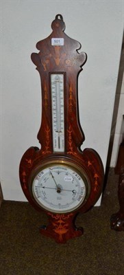 Lot 501 - An aneroid barometer/thermometer in an inlaid walnut banjo case