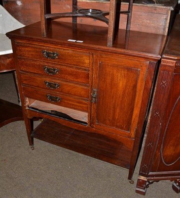 Lot 516 - An Edwardian walnut music cabinet