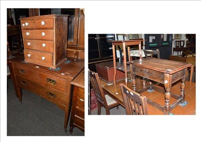 Lot 519 - A oak dressing table, an oak miniature chest, a box seat stool, an oak box and a carved table (5)