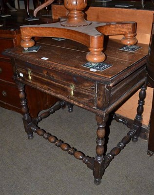 Lot 531 - An 18th century oak lowboy and later top