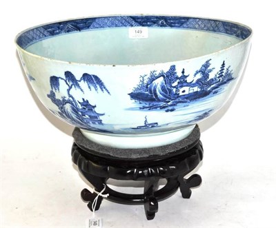 Lot 149 - A Chinese Porcelain Punch Bowl, Qianlong, painted in underglaze blue with a continuous river...